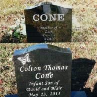 Two black granite headstones for Colton Thomas Cone, an infant, listing his parents, brothers, and date of death.