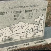A granite headstone for Thomas Arthur 