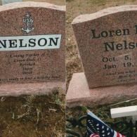 Two pink granite gravestones for Loren Nelson, one featuring a US Navy emblem and a small American flag below.