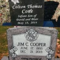 Two grave markers: a black headstone for Colton Thomas Cone (2014) and a gray Dallas Fire Dept. headstone for Jim C. Cooper.