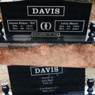 Two black granite cemetery monuments for the Davis family, featuring names, dates, and inscriptions in white text.