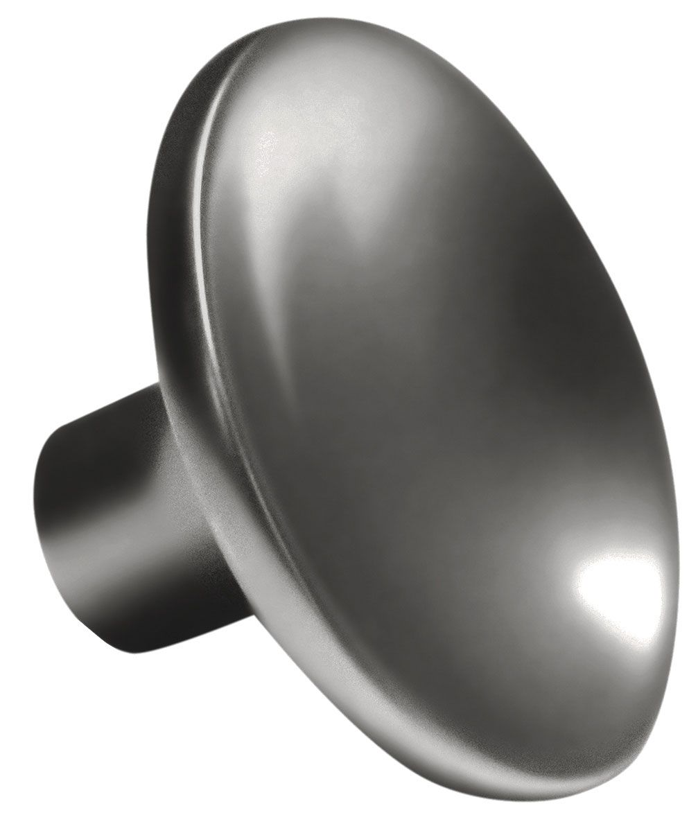 A close up of a metal knob on a white background