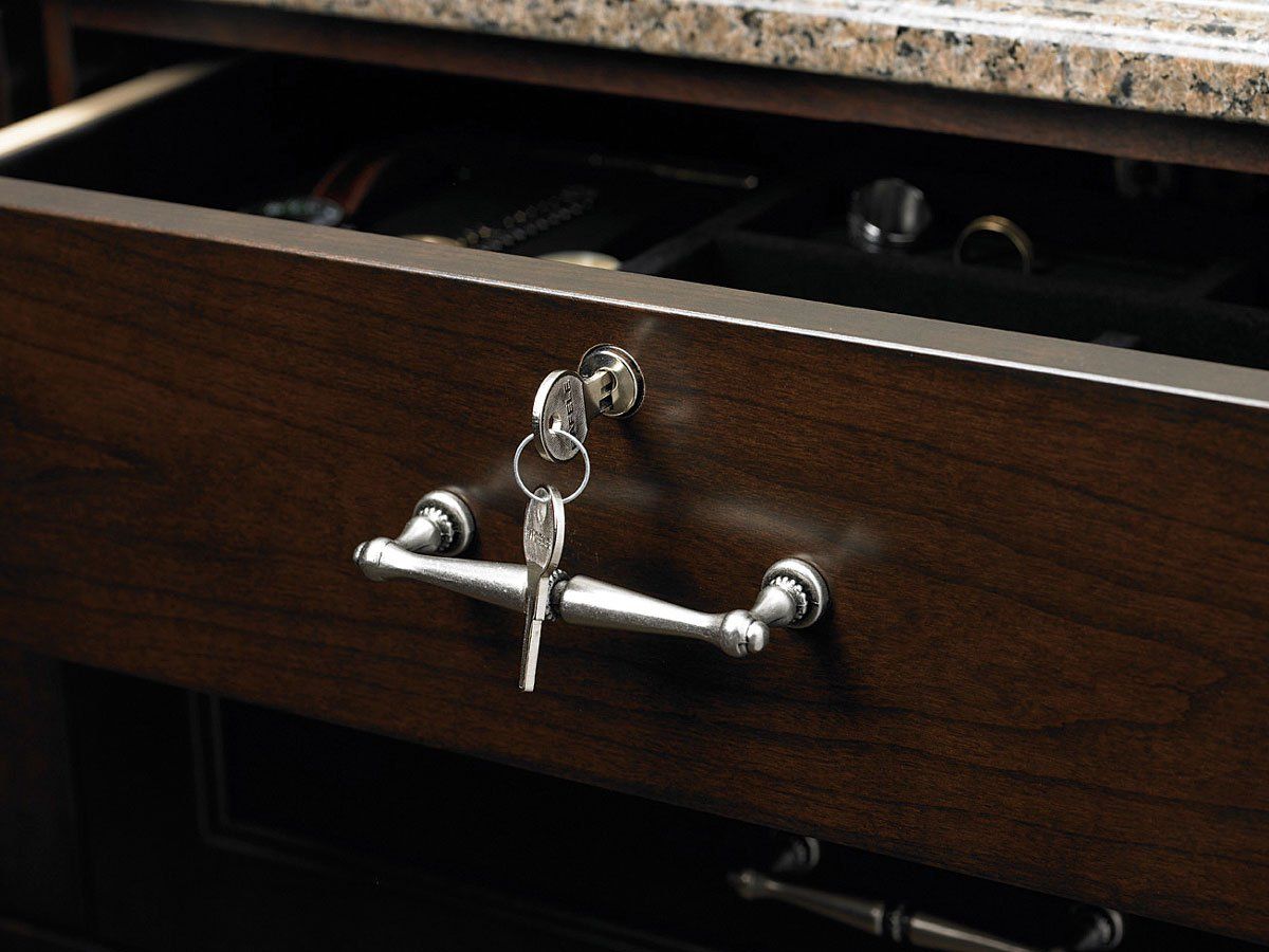 A close up of a drawer with a key in it