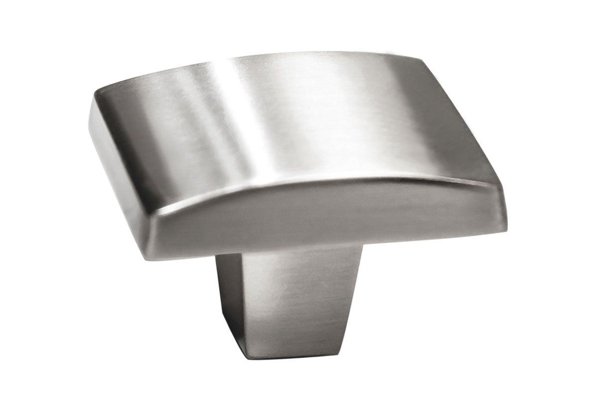 A square stainless steel knob on a white background