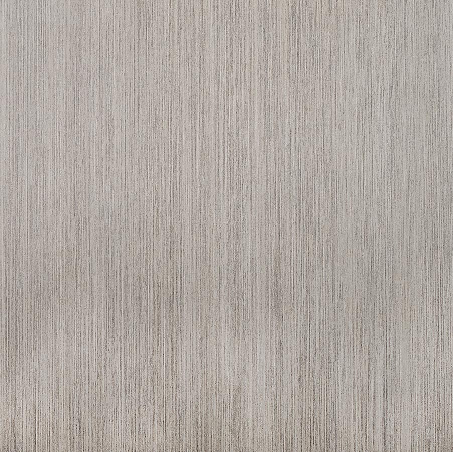 A close up of a stainless steel surface with a brushed finish.