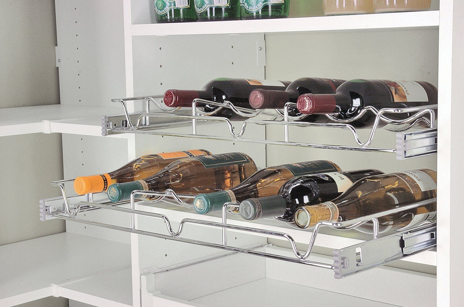 A wine rack filled with bottles of wine in a pantry.