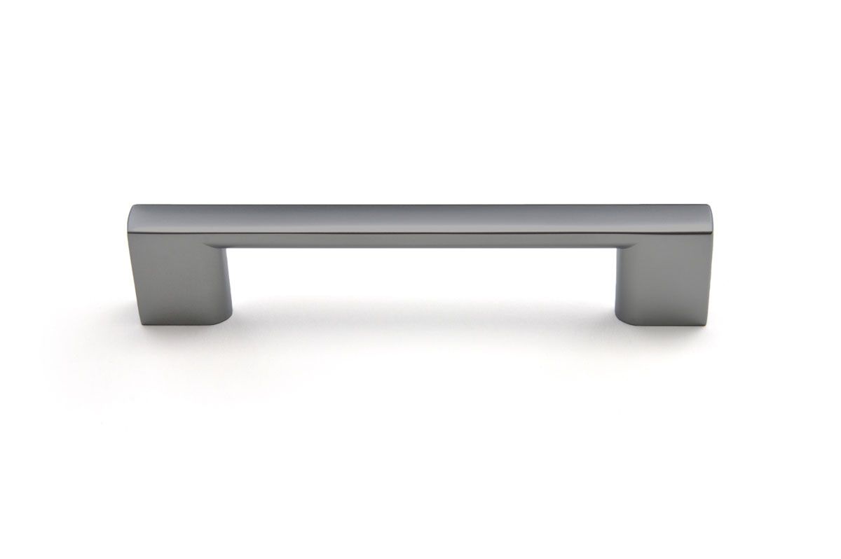 A stainless steel cabinet handle on a white background.