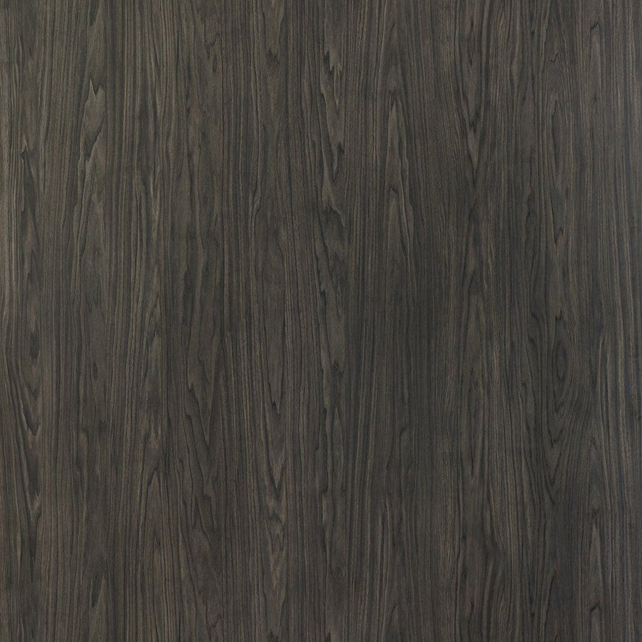 A close up of a dark wood grain texture.