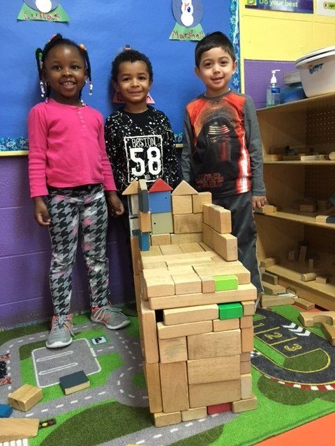 A boy wearing a shirt with the number 58 on it