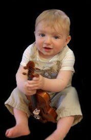Kid Holding Violin Instrument