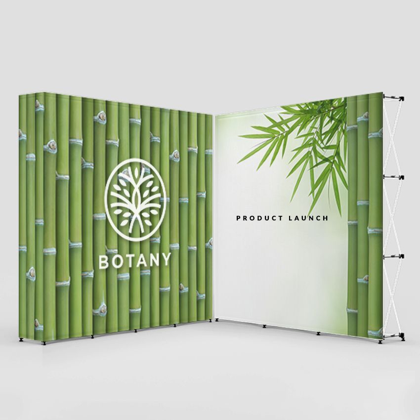 Display booth with a bamboo backdrop, a white background with a bamboo branch design, and the Botany logo.
