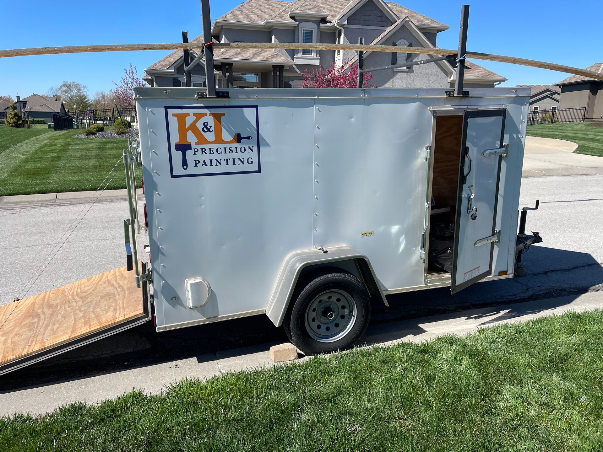 A white cargo trailer with a 