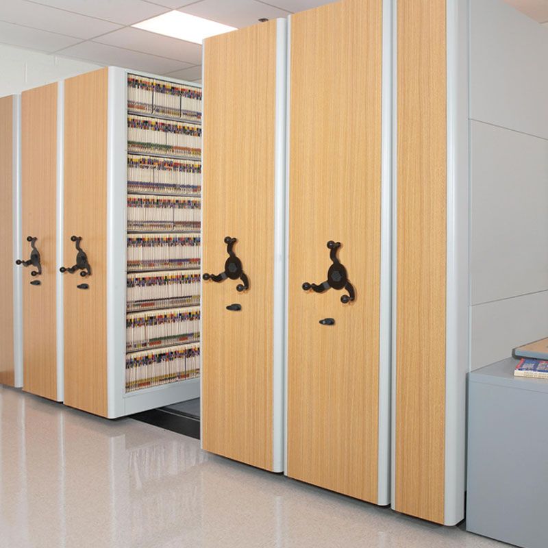 Loading docks with closed silver doors on a modern warehouse building.