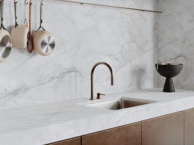 A Kitchen With a Sink and Pots and Pans Hanging on the Wall — Stone Effects In Forest Glen, QLD