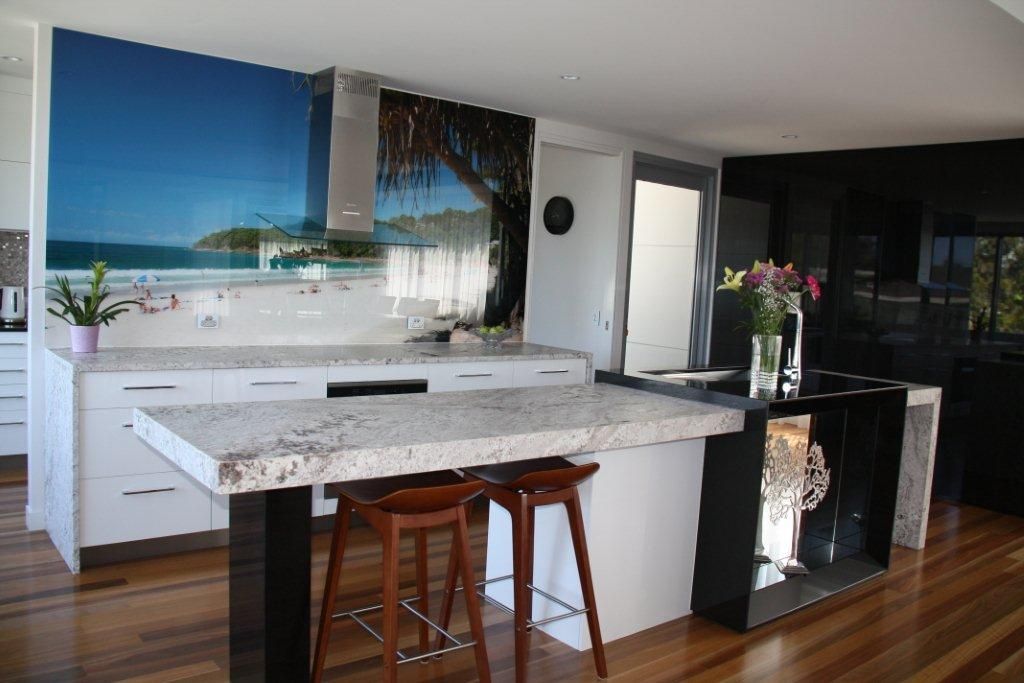 A Kitchen With a Large Island and Two Stools — Stone Effects In Forest Glen, QLD