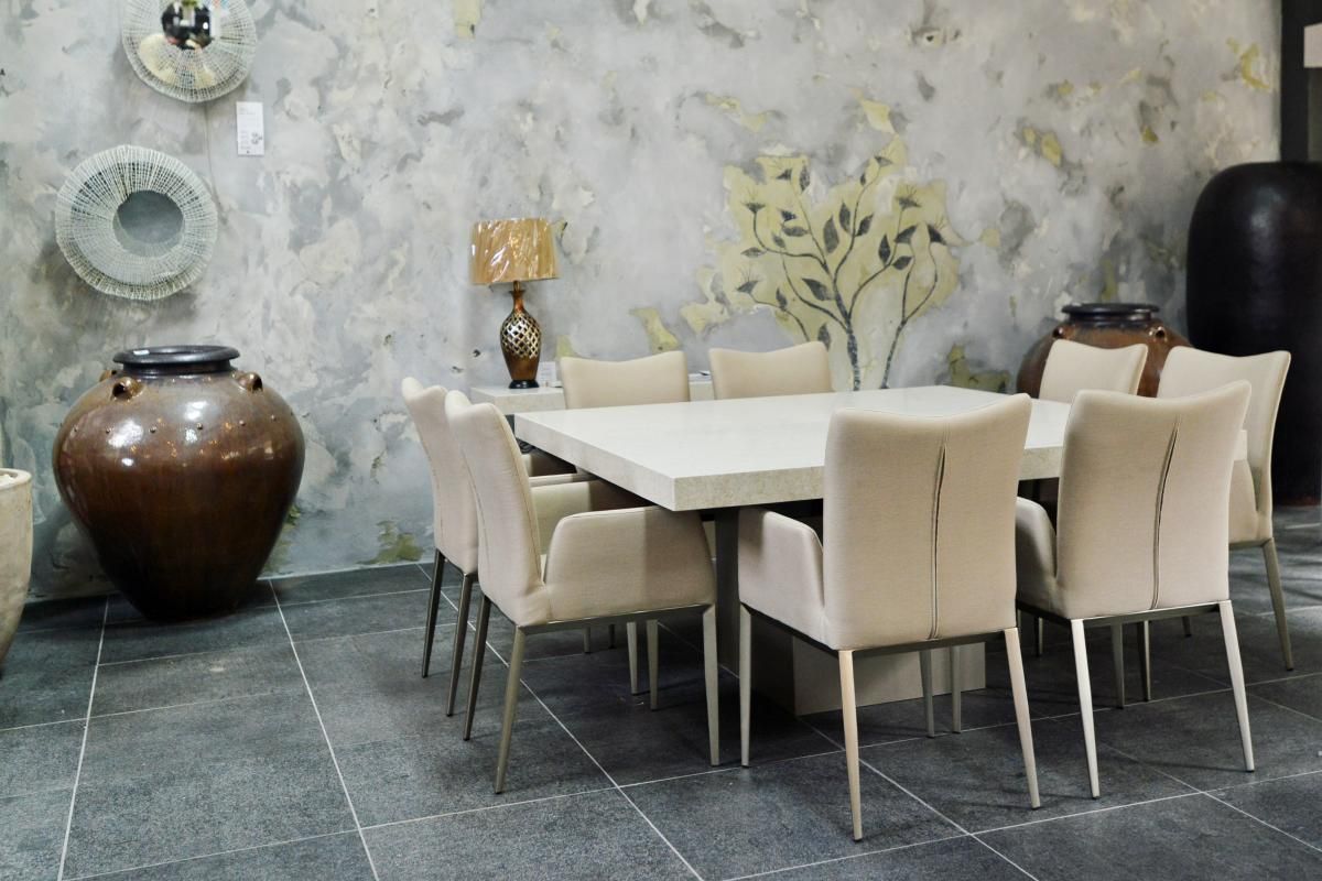 A Dining Room With a Table and Chairs and Vases on the Wall — Stone Effects In Forest Glen, QLD