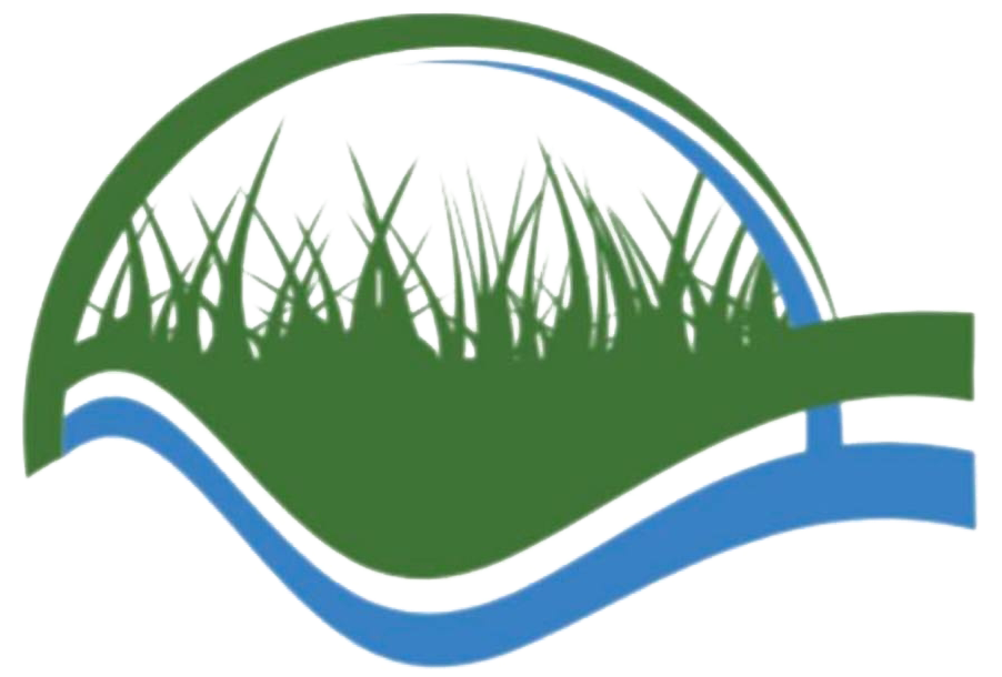 A green and blue logo with a leaf and grass on it