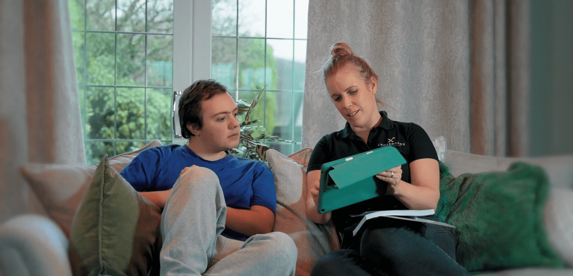 Young boy being taught by Kate