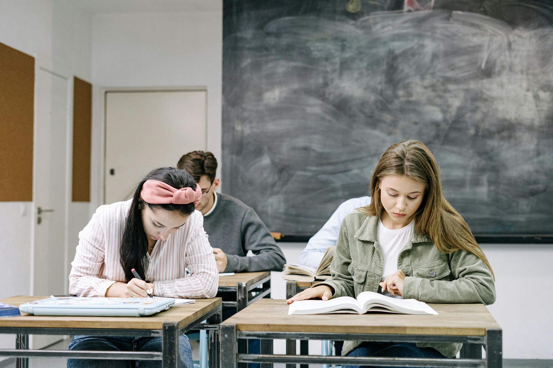 Teenagers taking an exam