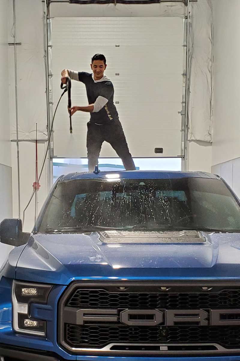 Cleaning Car's Windshield — Woodbridge, VA — First Class Tint & Vinyl