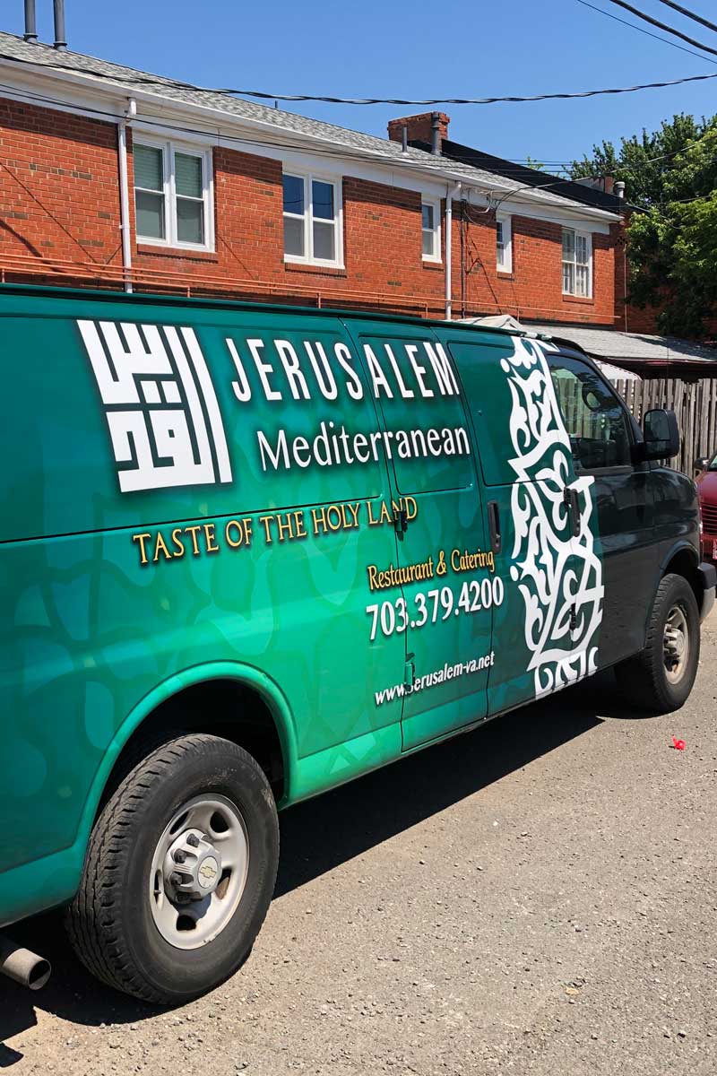 Van with Custom Vinyl Wrap — Woodbridge, VA — First Class Tint & Vinyl