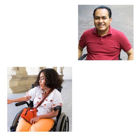 a man in a red shirt is sitting next to a woman in a wheelchair