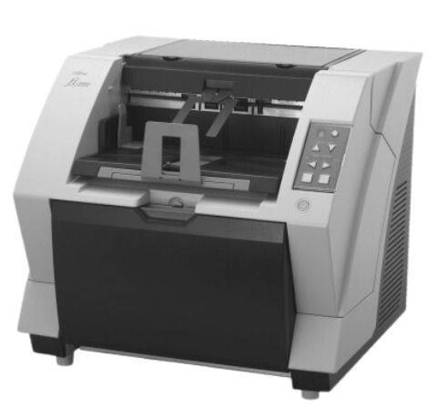 Una fotografía en blanco y negro de una máquina de fax