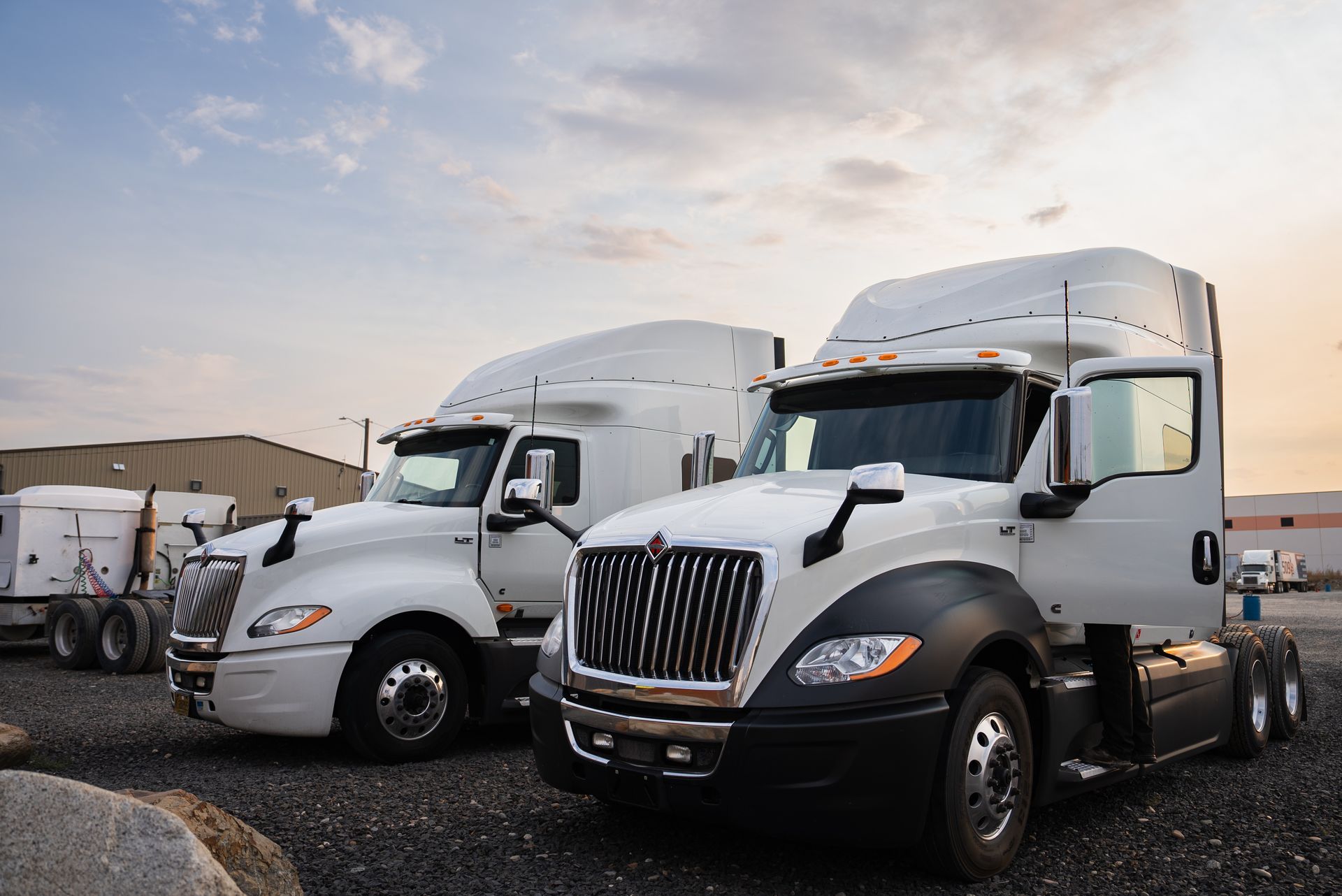 A student going to CDL school and attempting to back up a white semi for Class A CDL