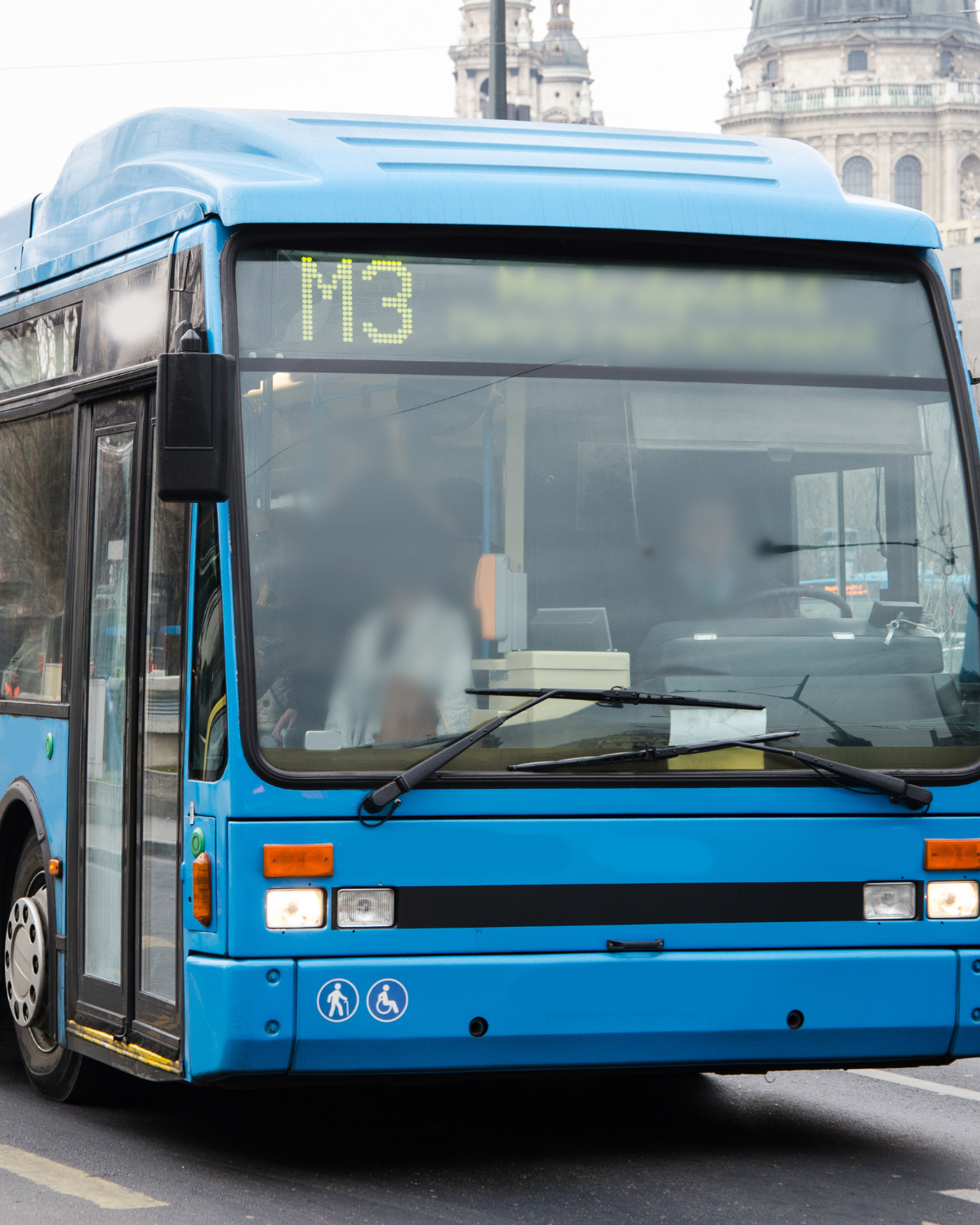 Passenger bus driving around in the city