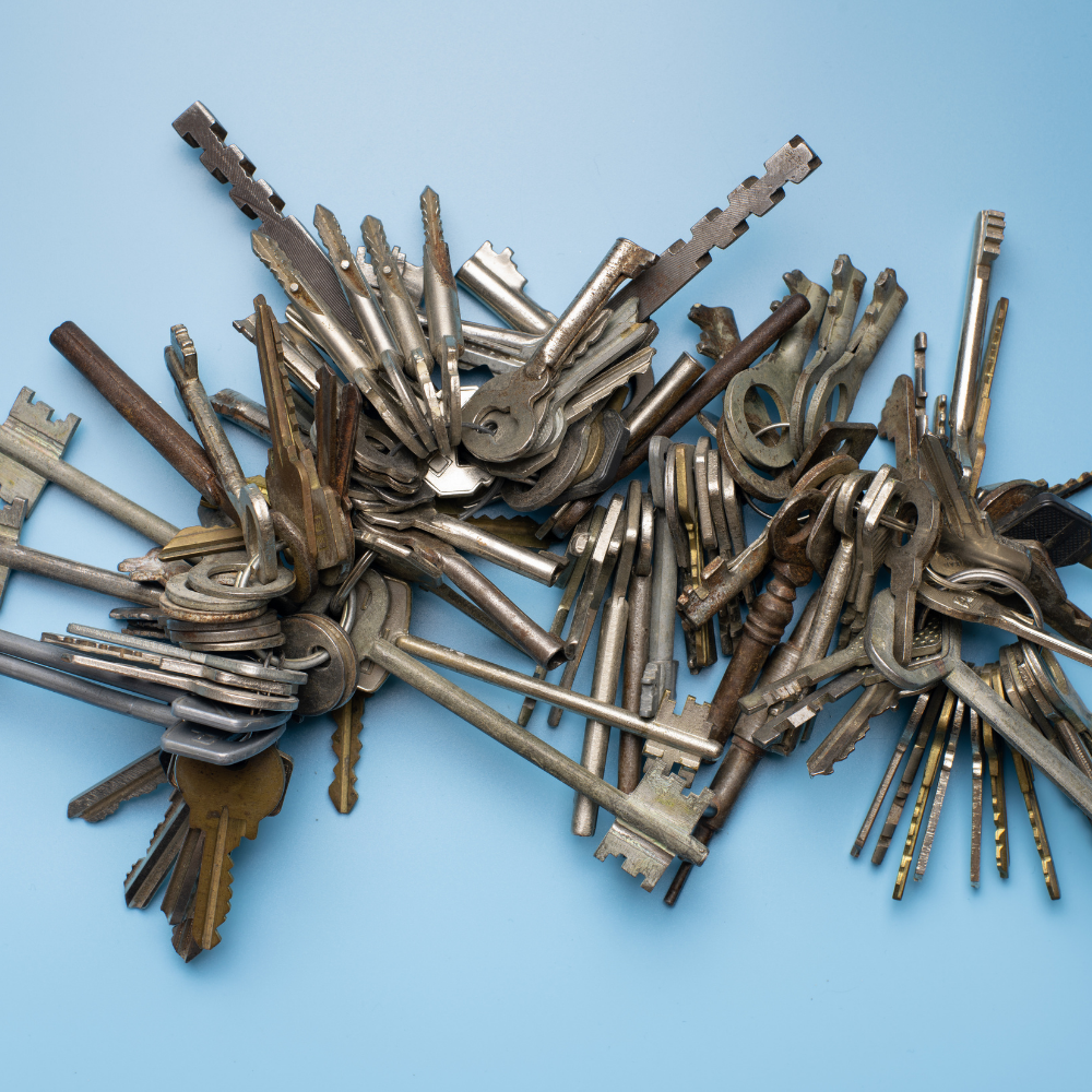 Fire truck and SUV parked outside a brick fire station; emergency lights on.