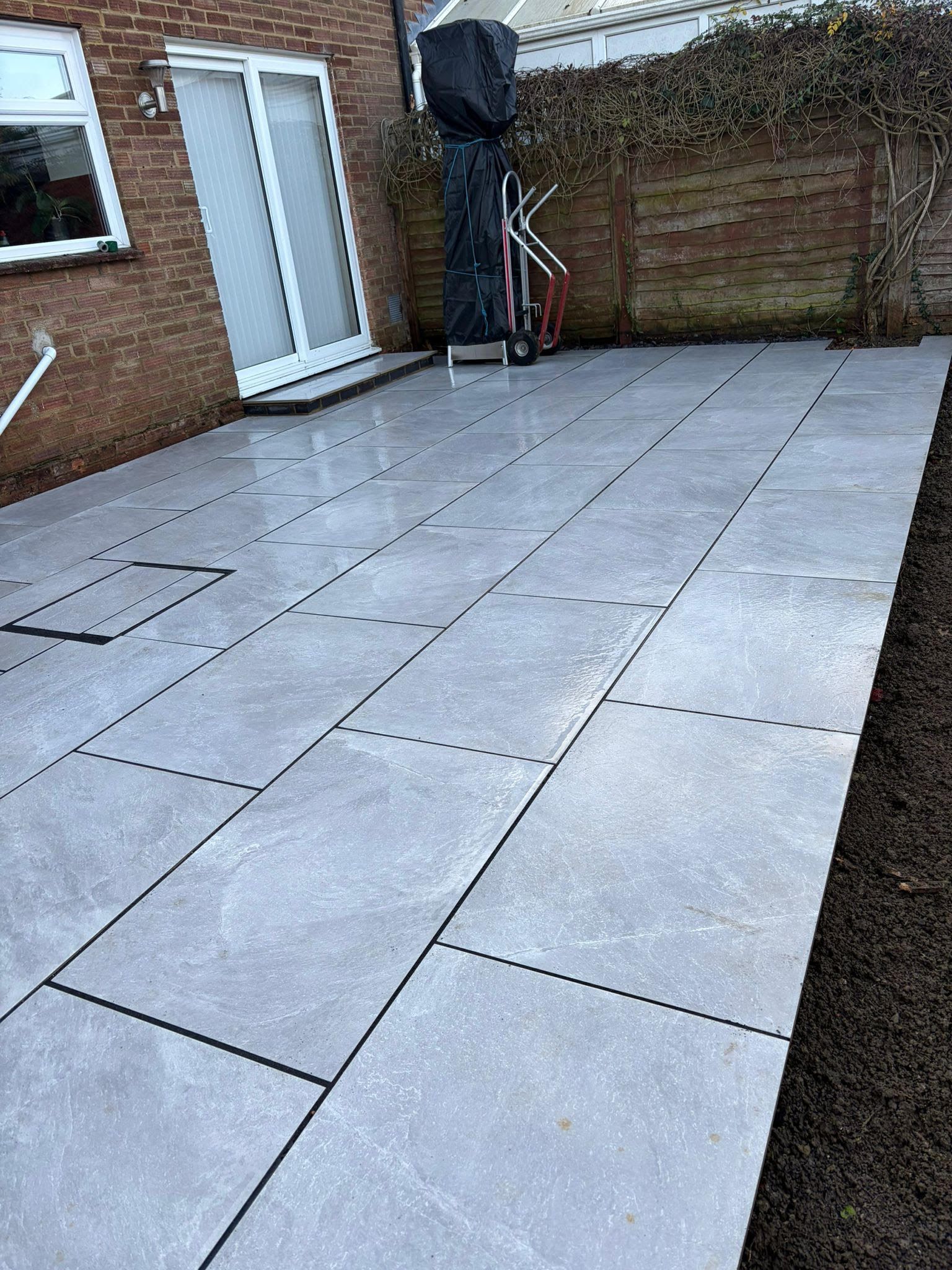 Stunning professional Porcelain Paving Patio installed in Dunstable