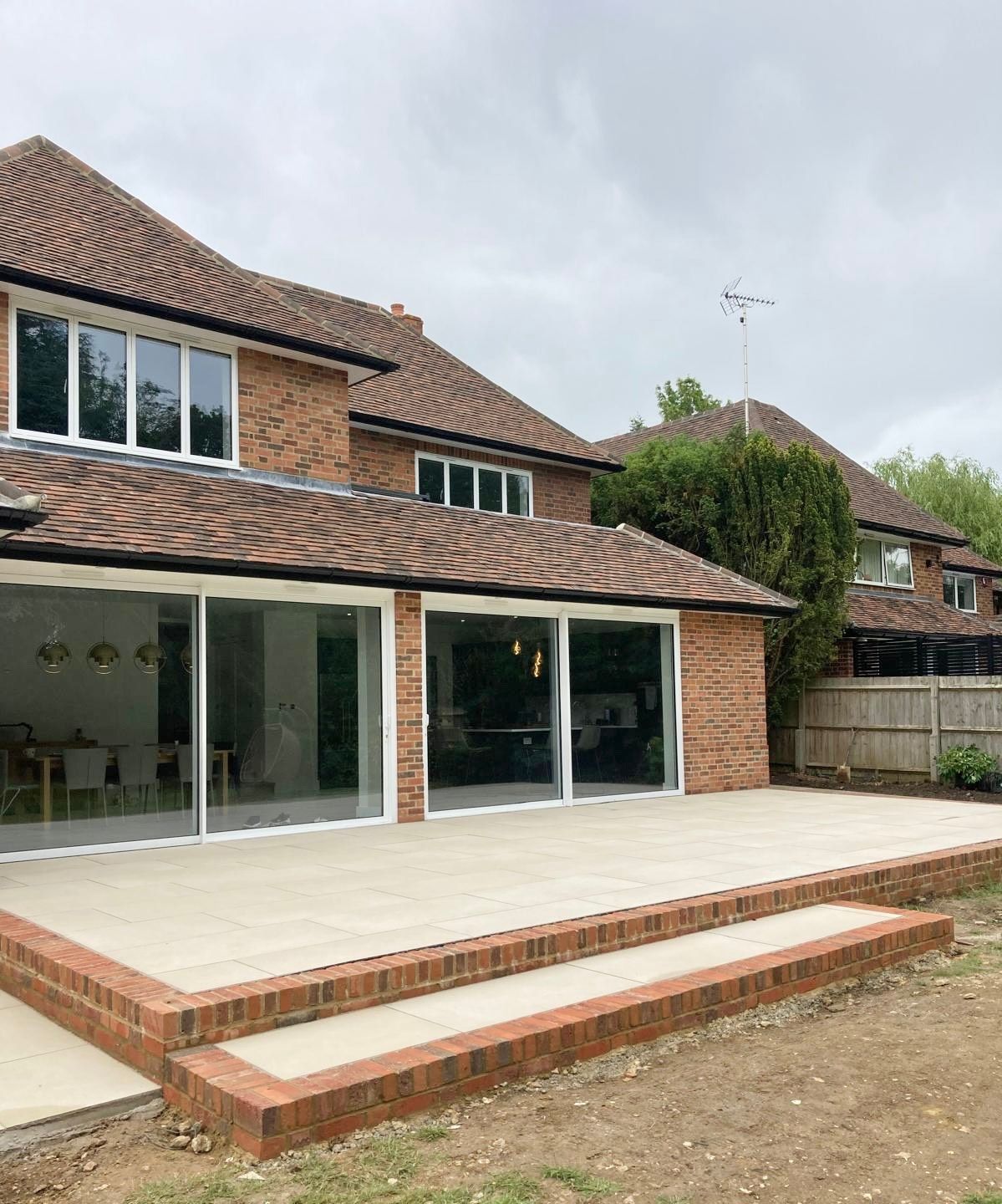 Recently completed new porcelain paving patio with installed in Hitchin.