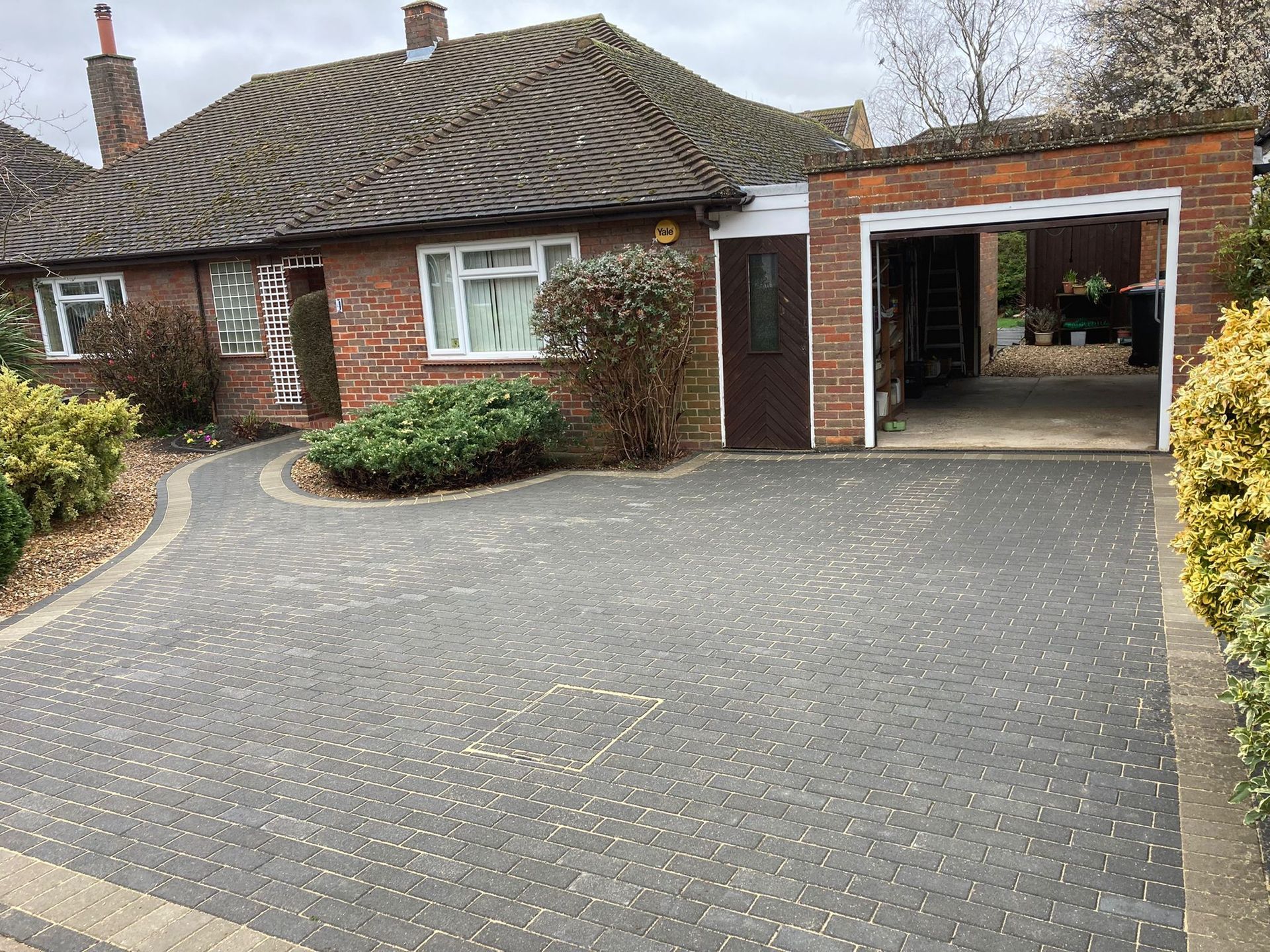 beautiful double driveway installation in Hemel Hempstead using grey block paving.