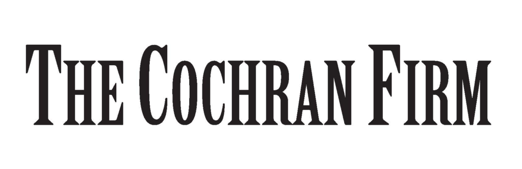 A black and white logo for the cochran firm