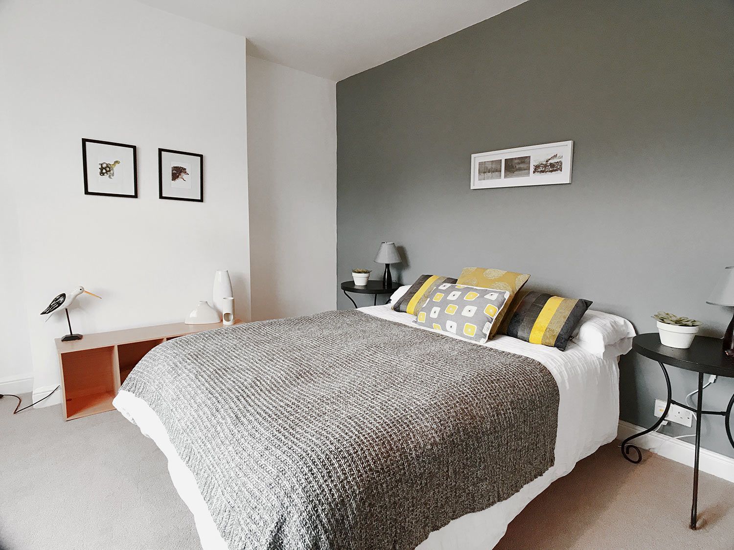 Bedroom with gray accent wall