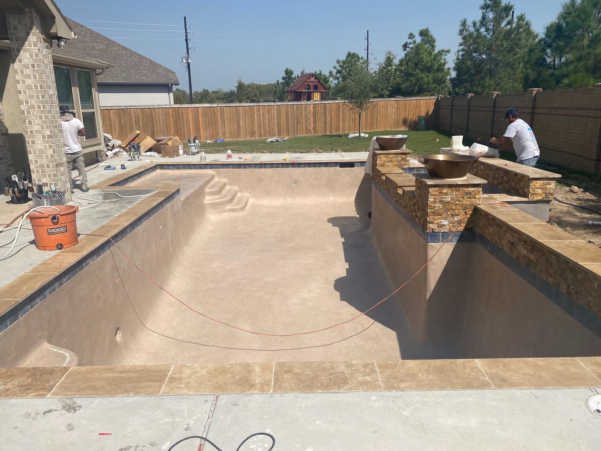 After Stonescapes Sand It— Houston, TX — AAA Pool Plastering
