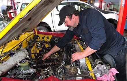 Repairing wheel — Car and Trucks Repairs in Caloundra, QLD