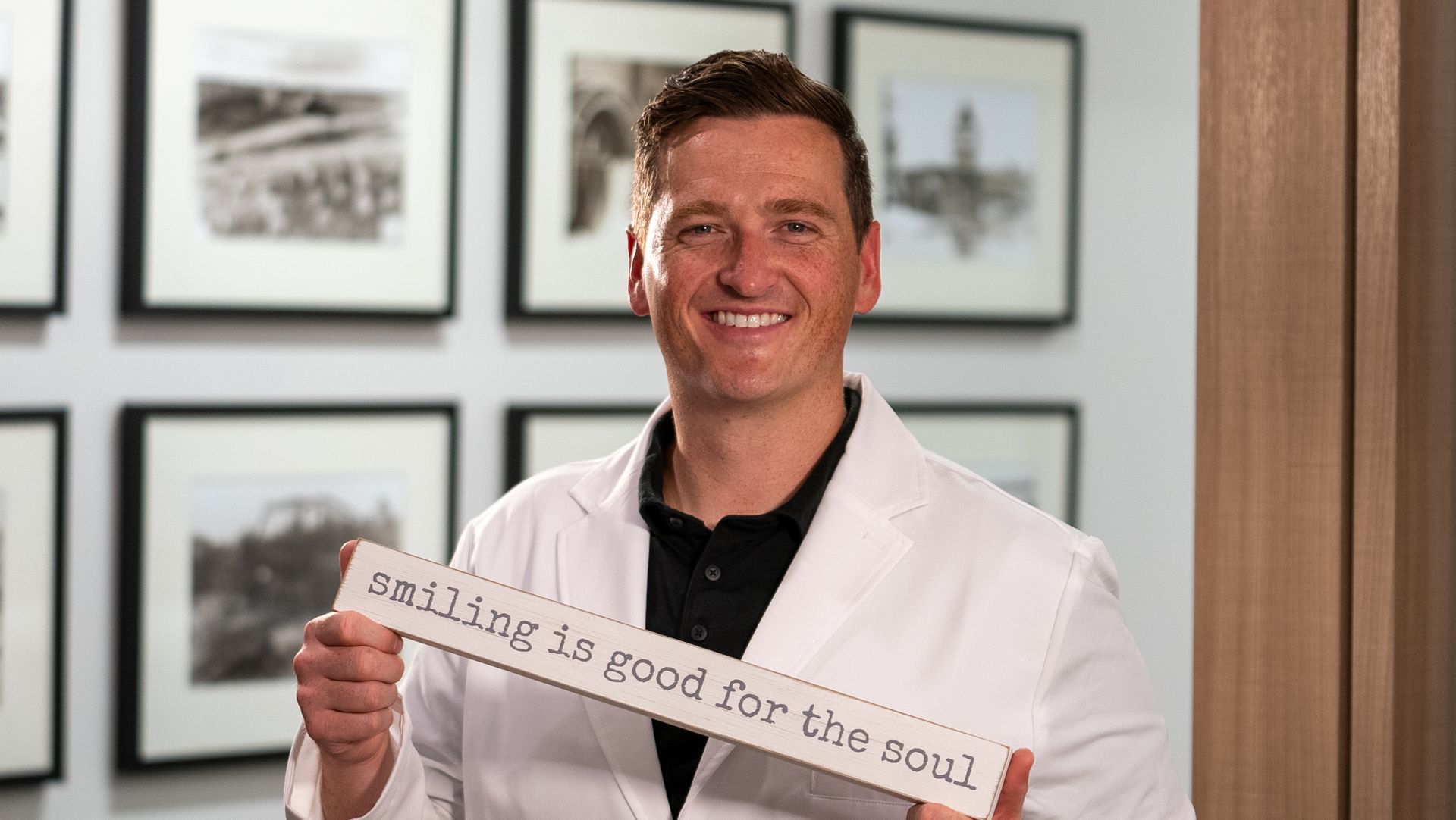 A man in a lab coat is holding a sign that says nothing is good for the soul.