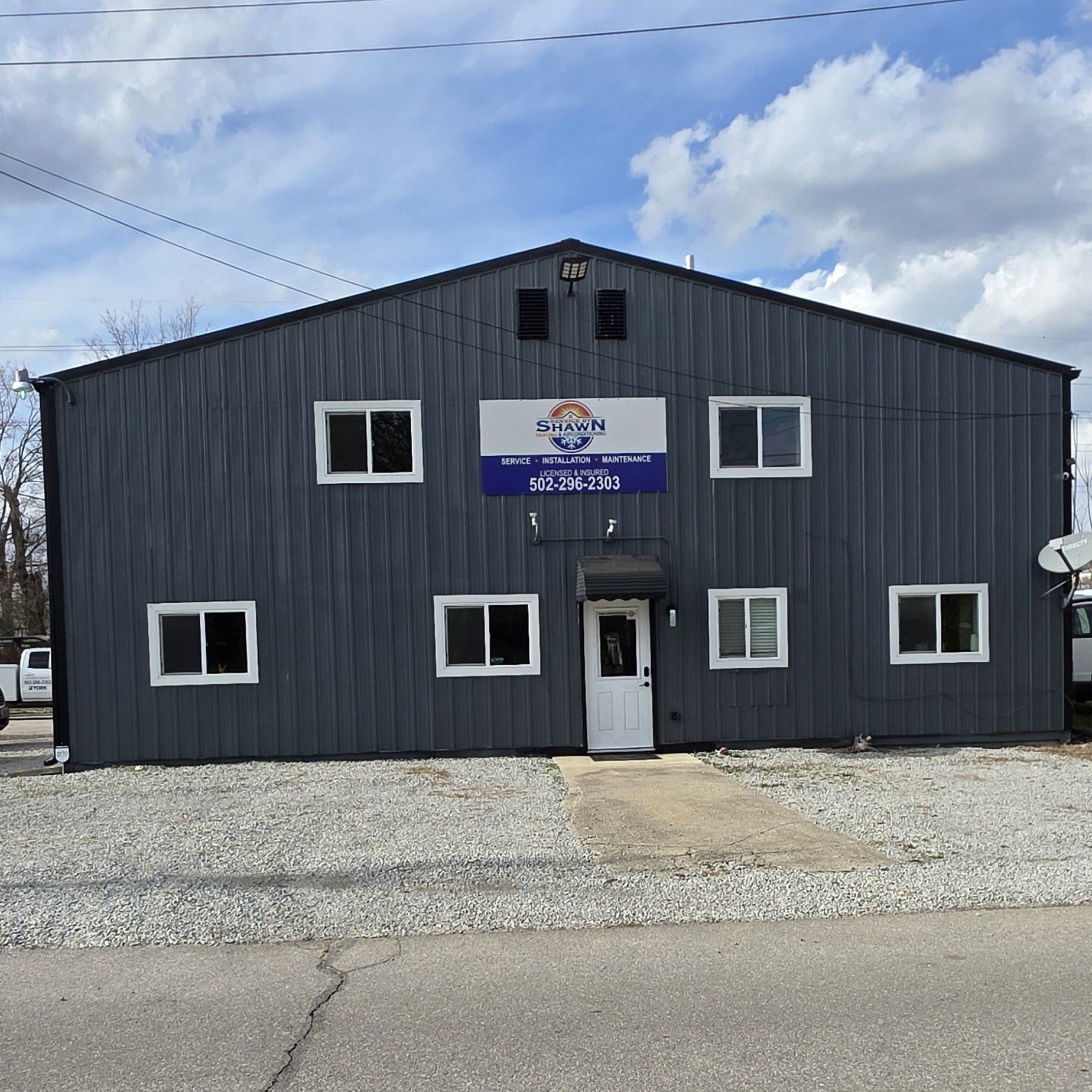 A large building with a sign on the side that says laugh