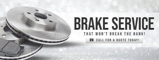 Brake Service advertisement featuring brake rotors and text that says, 