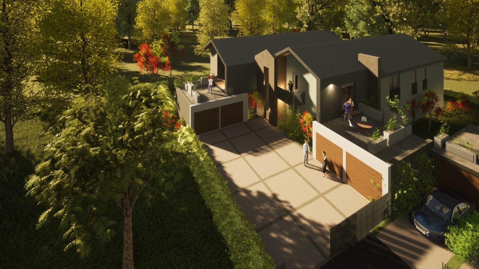 Una vista aerea di una casa con un'auto parcheggiata di fronte, circondata da alberi.