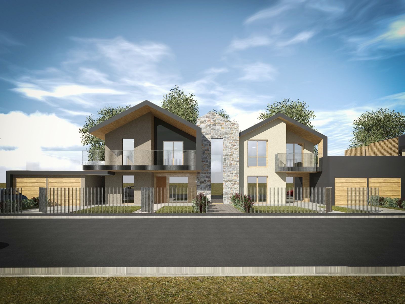 Un paio di case sono una accanto all'altra sul ciglio di una strada.