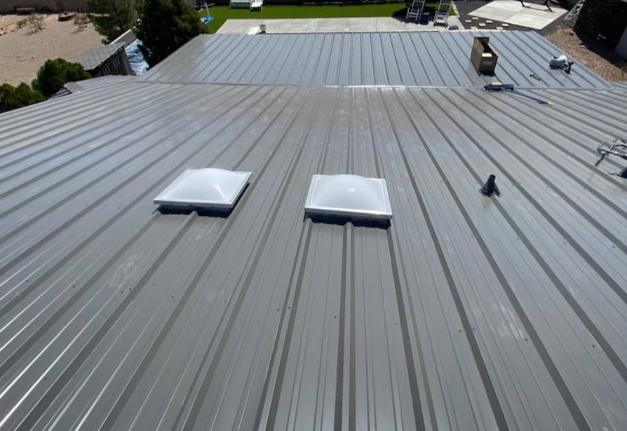 Metal roof with two skylights.