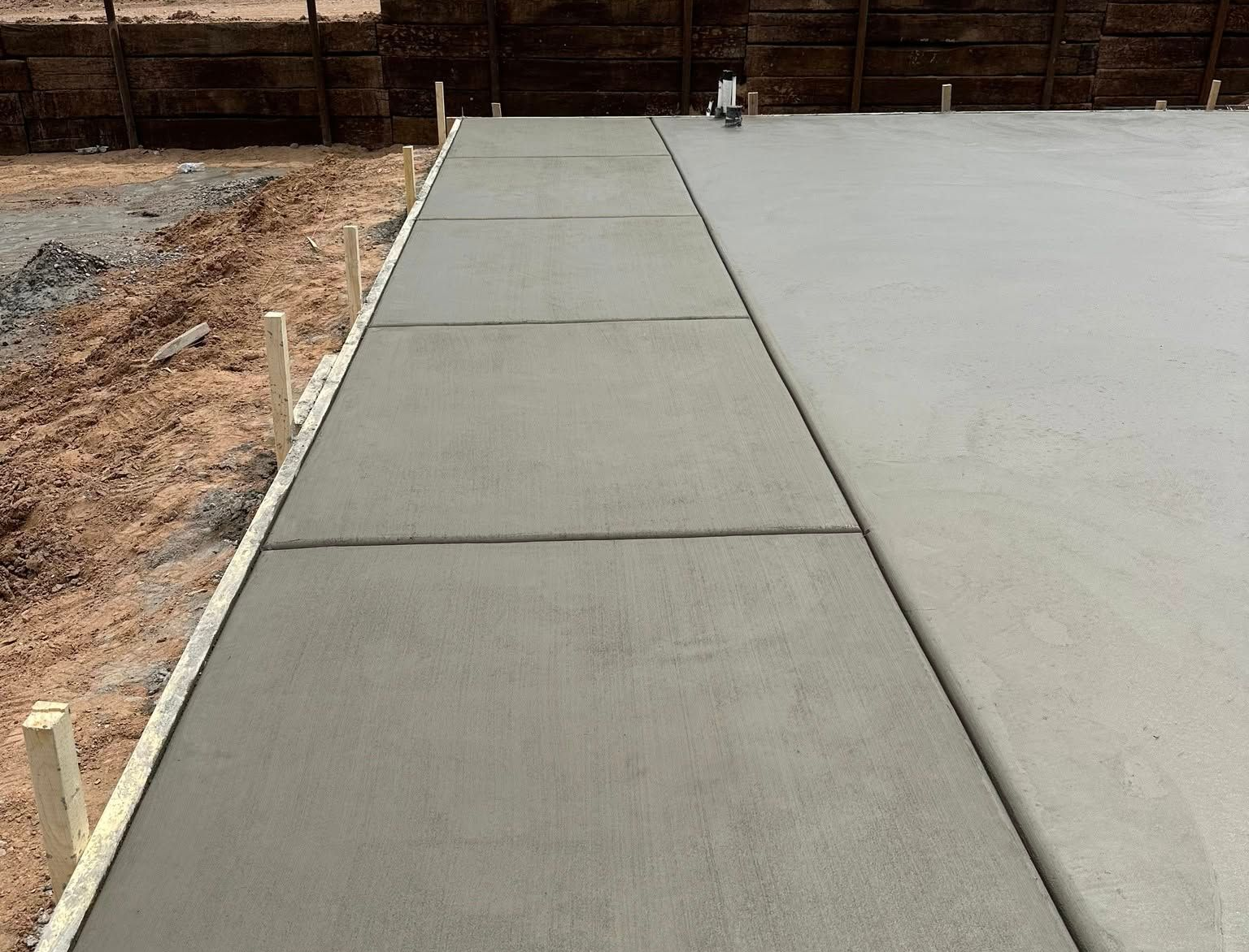 Freshly poured concrete pathway and patio.