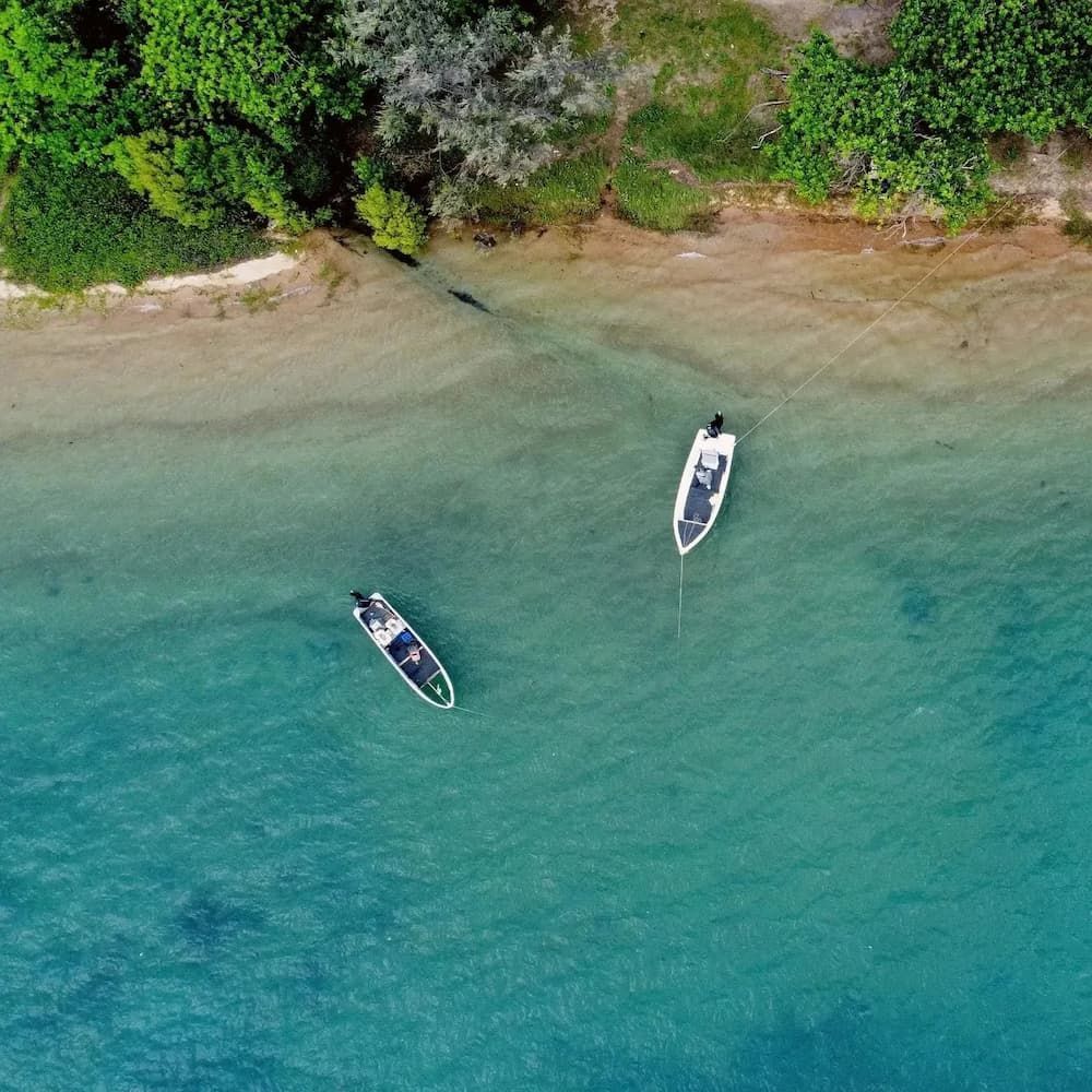 Aerial View of Two Small Boats on the Sea — Adventure Cairns & Beyond in Cairns City, QLD