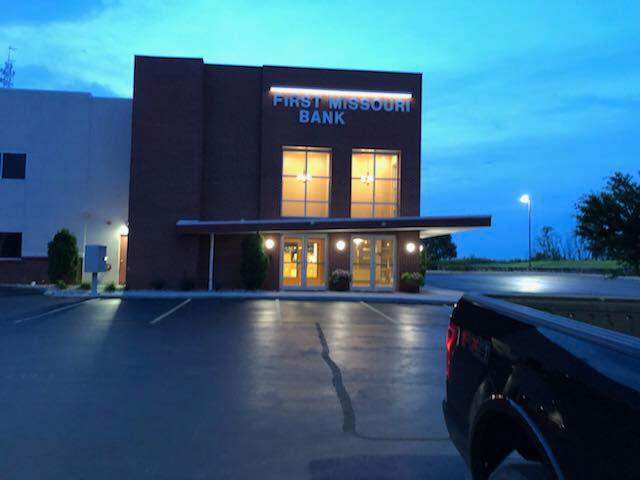 A truck is parked in front of a first missouri bank