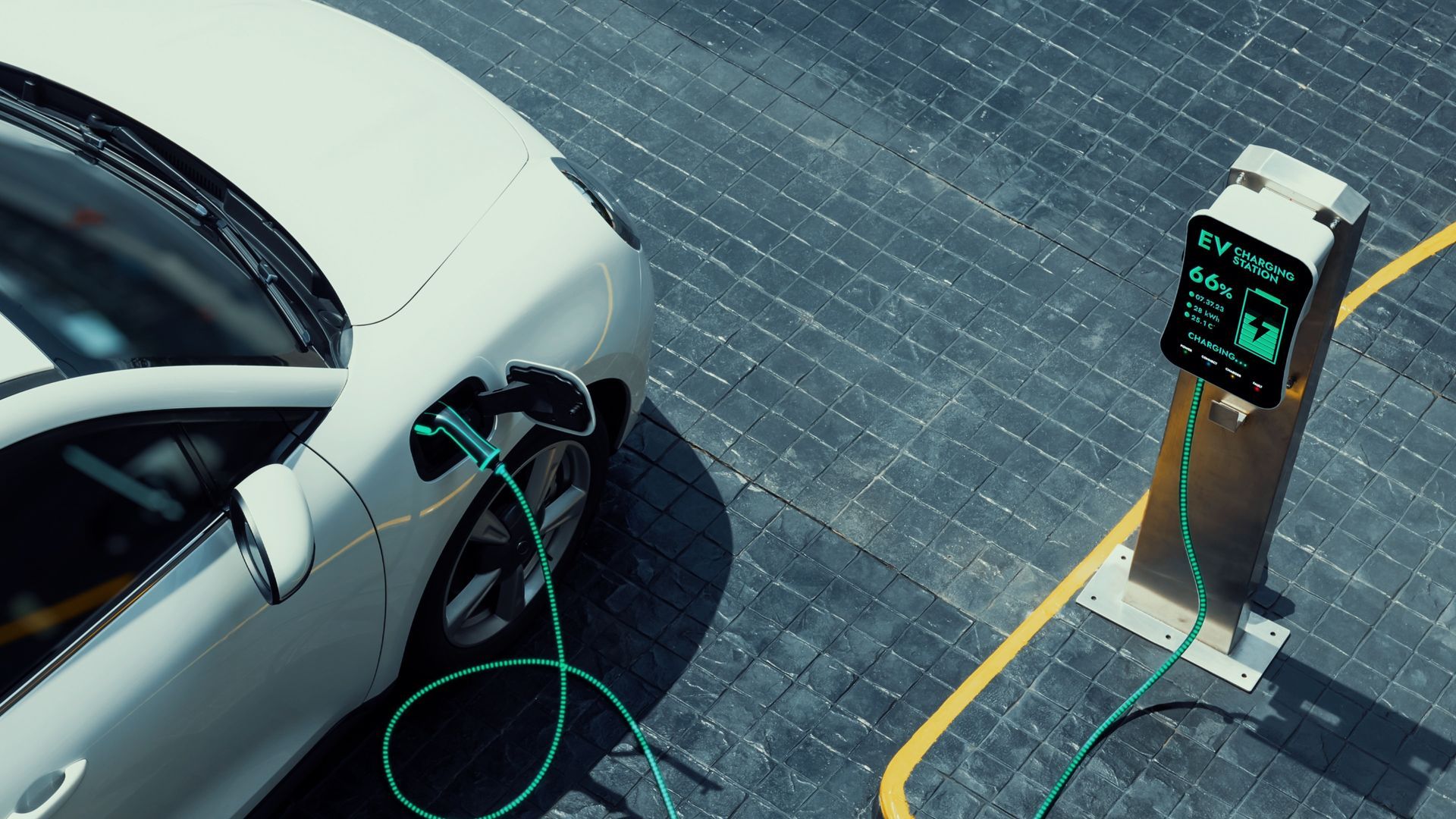 A person is charging an electric car at a charging station.