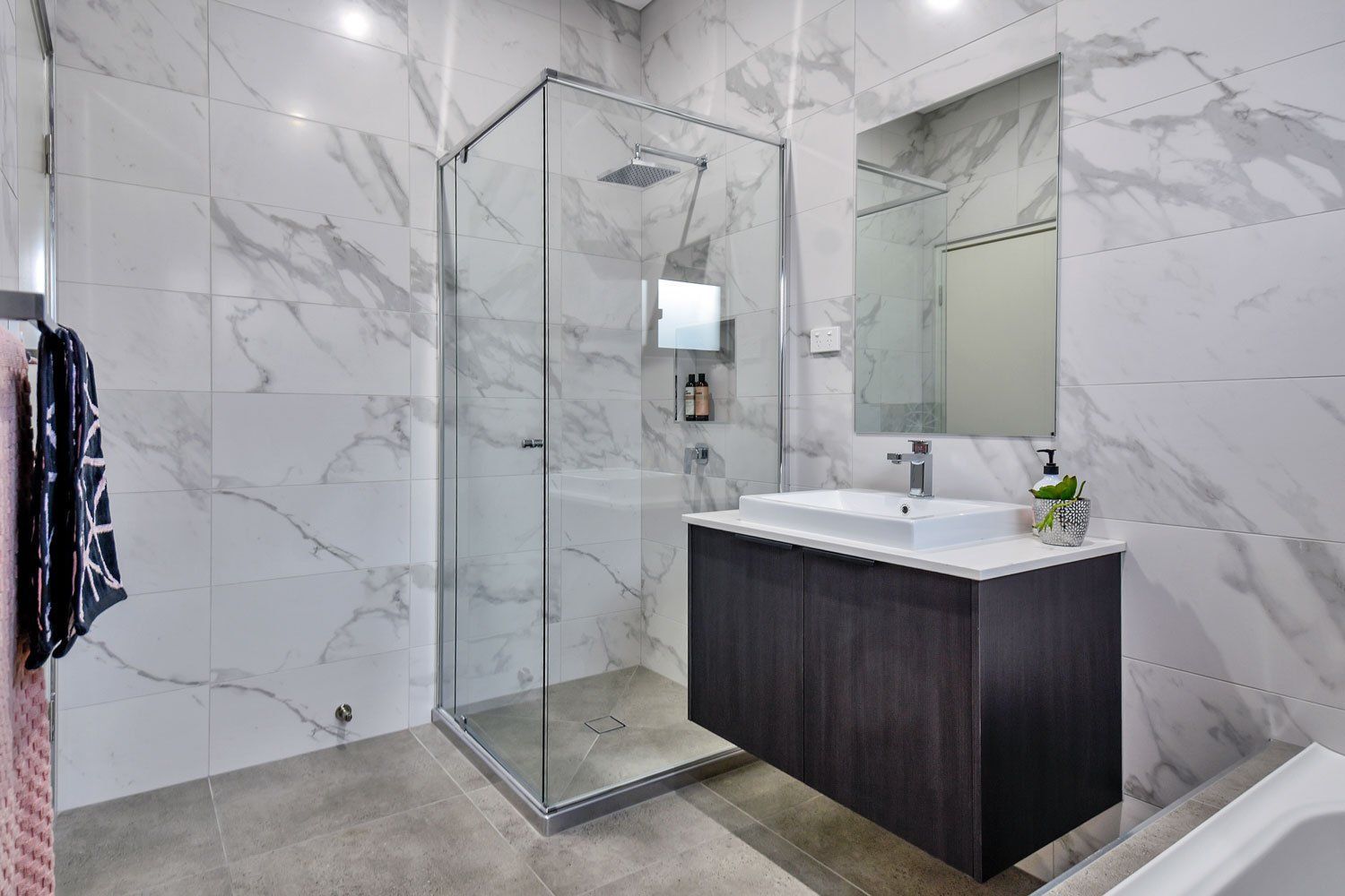 A Bathroom With a Walk in Shower, Sink, Mirror and Bathtub — Top End Joinery In Yarrawonga, NT