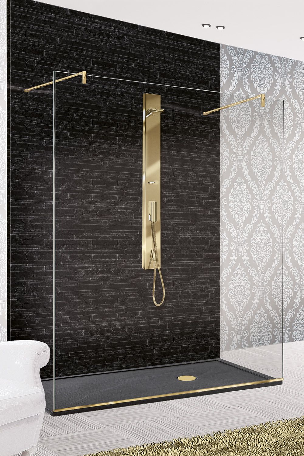 Un bagno con cabina doccia e soffione dorato.