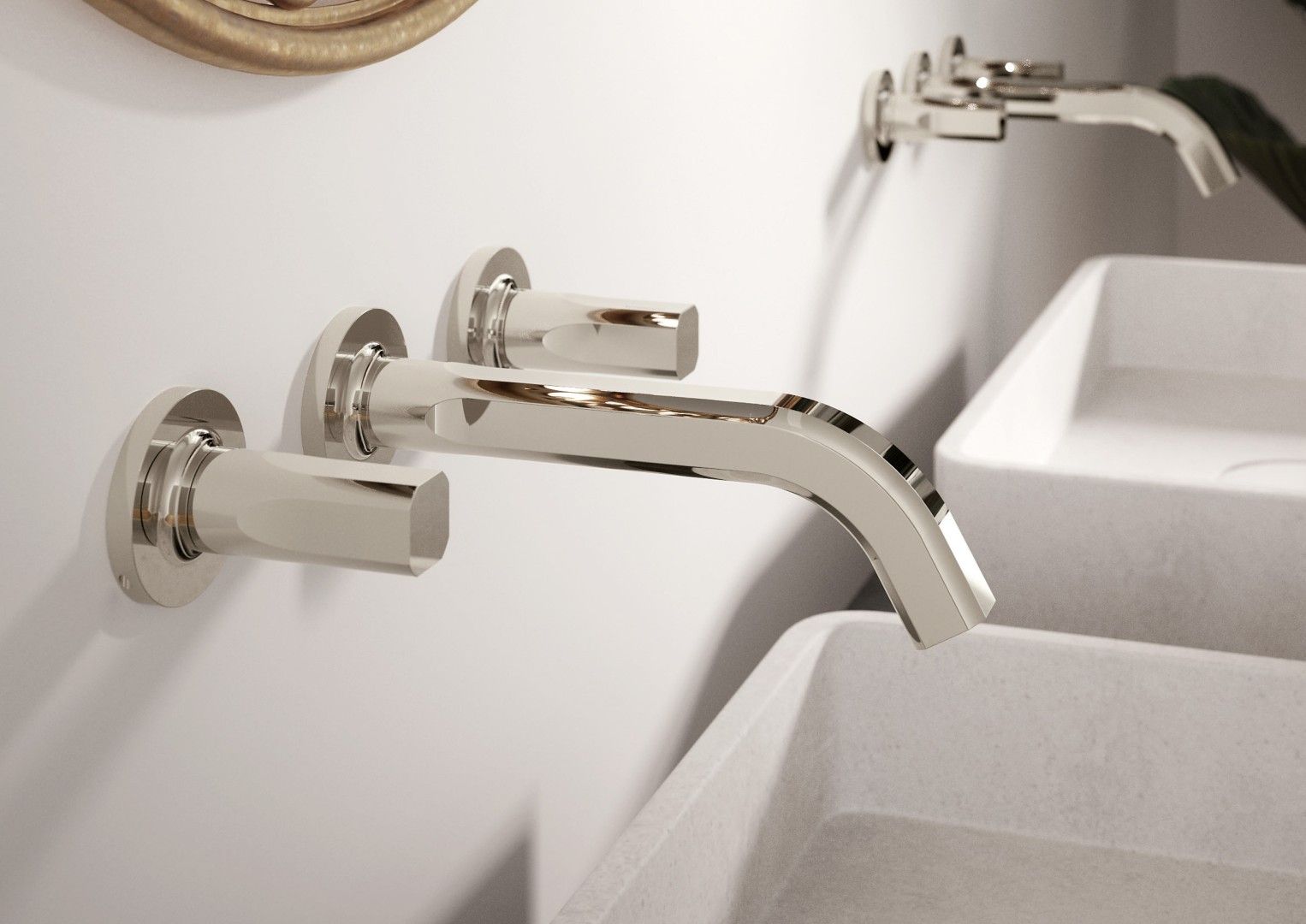 Un bagno con due lavandini e un rubinetto a muro